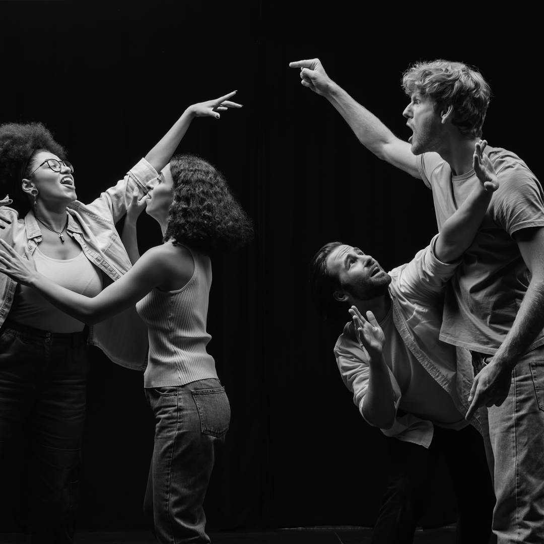 full length of young multiethnic actors posing while rehearsing in acting skills school